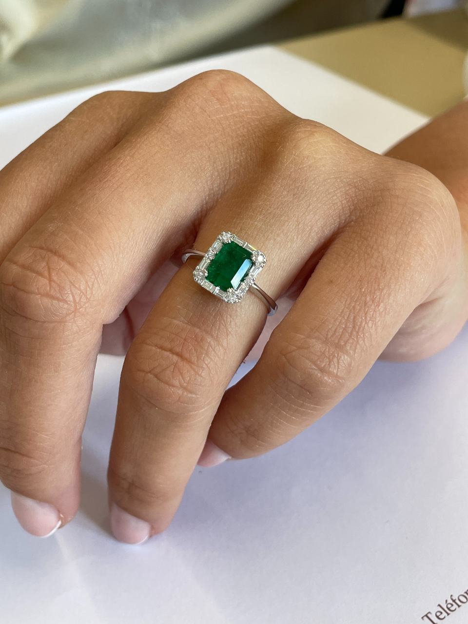 BETANZO ring with emeralds, baguettes and diamonds in 18k white gold