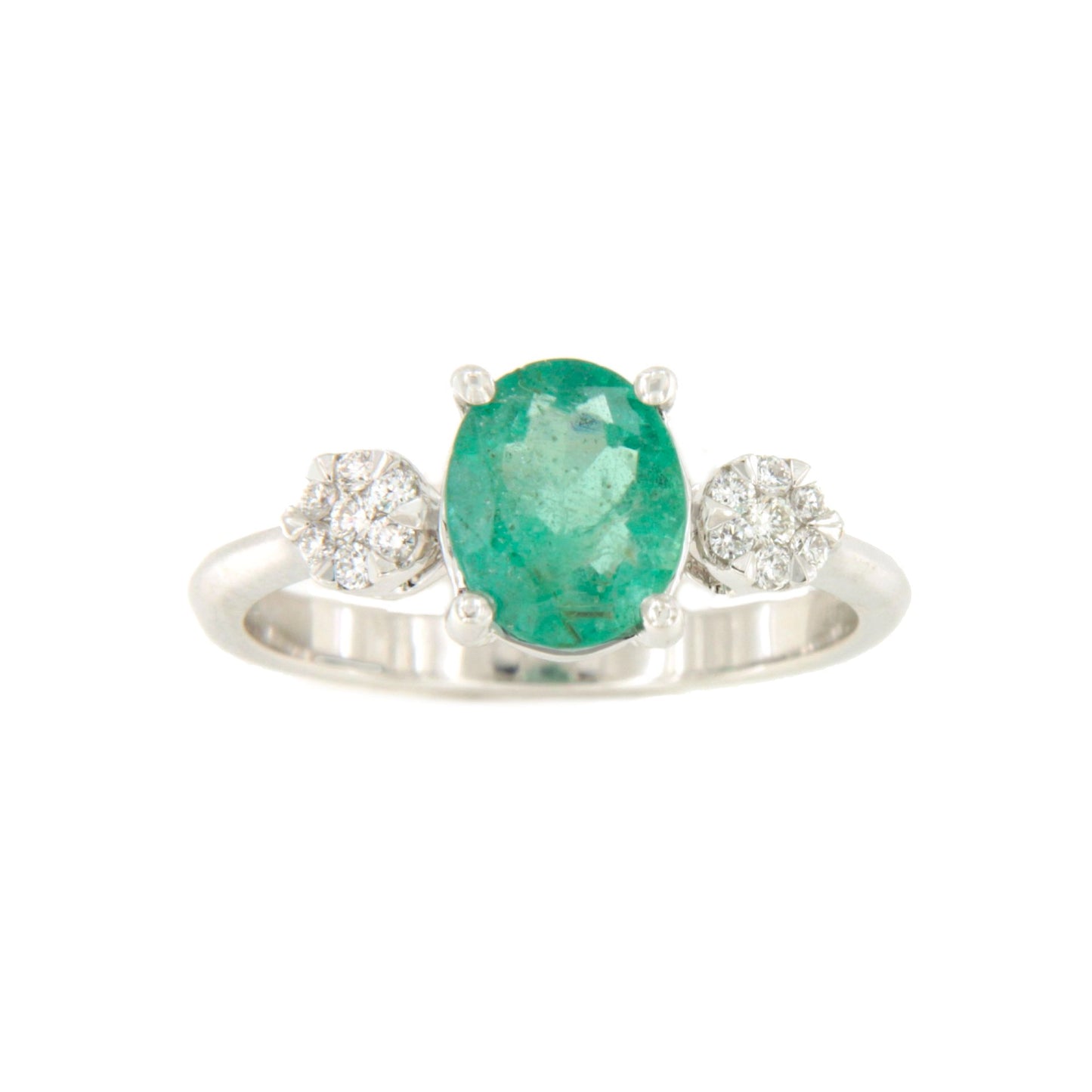 Anillo MANGO esmeralda oval y brillantes en oro blanco de 18 ktes.