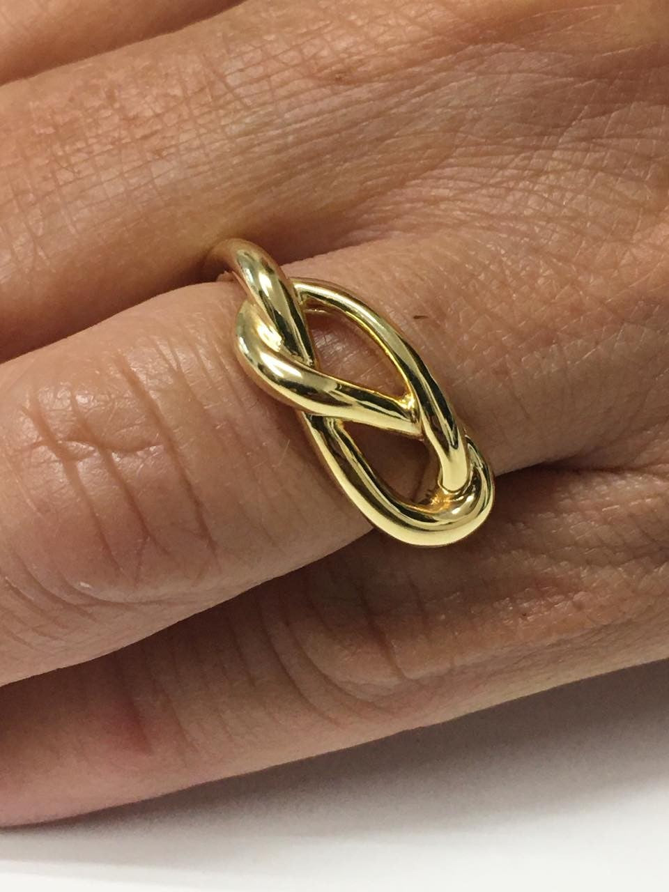 Anillo SIMGE en oro amarillo de 18 kilates con nudo marinero - Roman Joyero