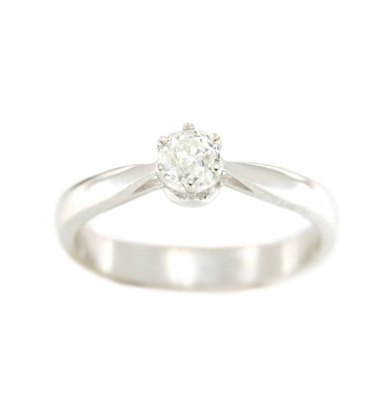 Solitario ELMAS en oro blanco de 18 kilates con brillante