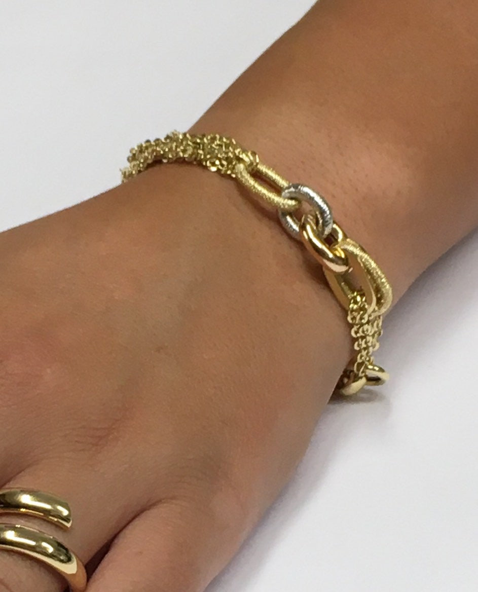 Pulsera ASLAN de oro en tres colores de varios tipos de eslabones de cadenas - Roman Joyero