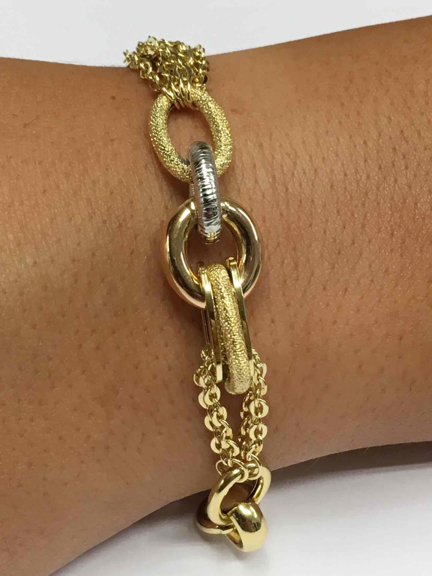 Pulsera ASLAN de oro en tres colores de varios tipos de eslabones de cadenas - Roman Joyero