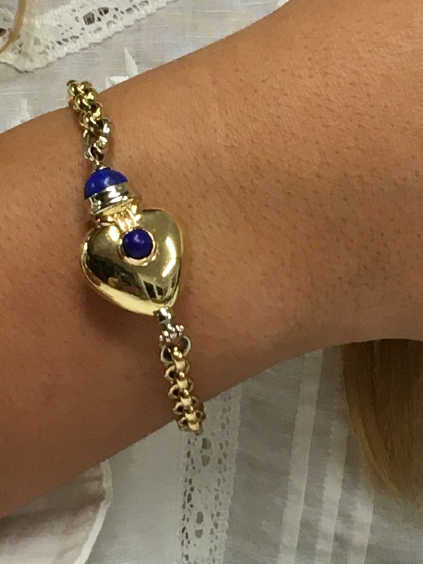 Pulsera KURT nueva en oro de 18 ktes con corazón y lapislázuli