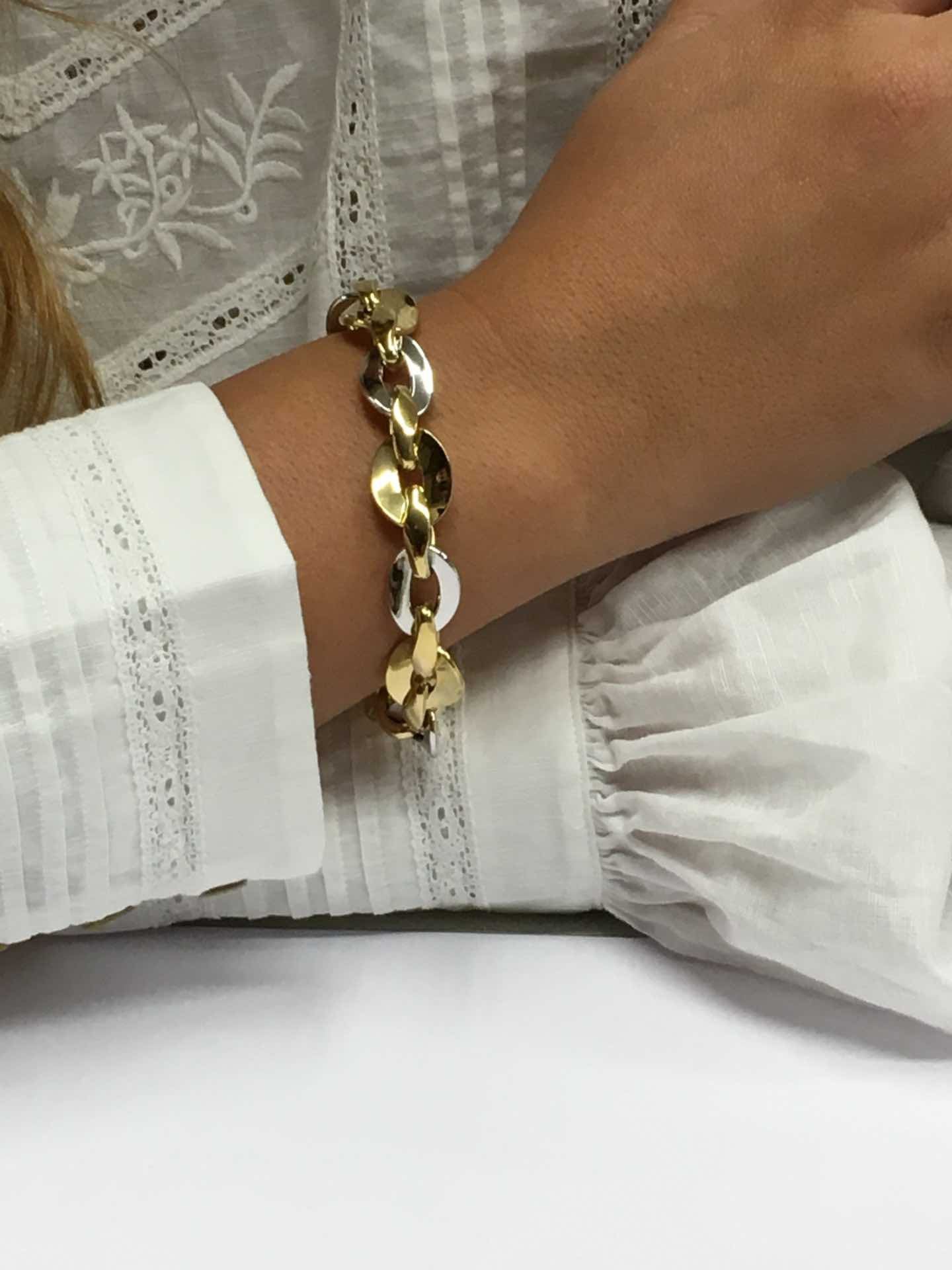 Pulsera OMER en 2 colores de oro 18 kts con eslabones huecos