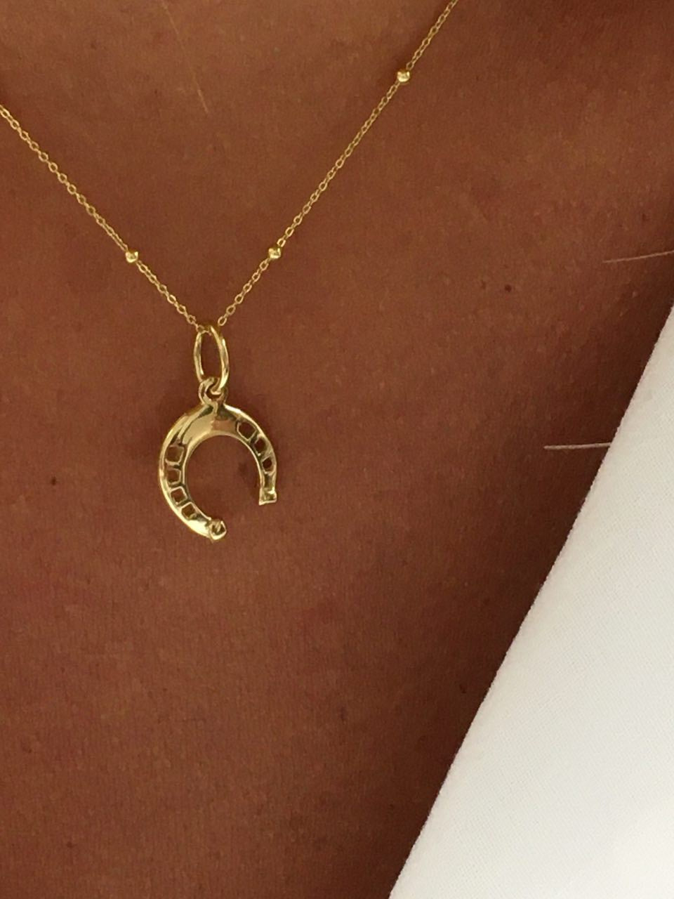 Colgante con un motivo herradura TANKUT en oro de 18 Kilates - Roman Joyero