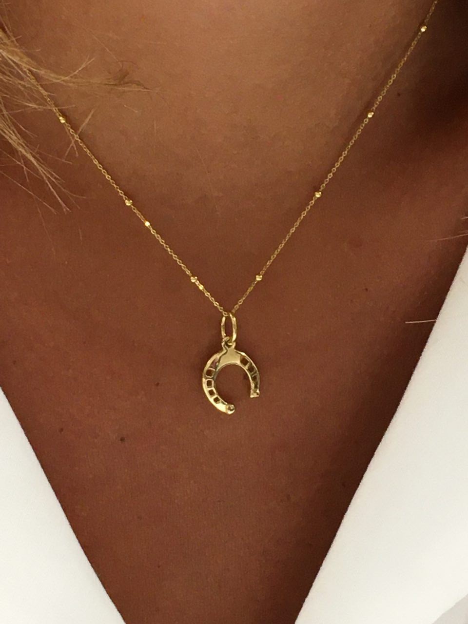 Colgante con un motivo herradura TANKUT en oro de 18 Kilates - Roman Joyero