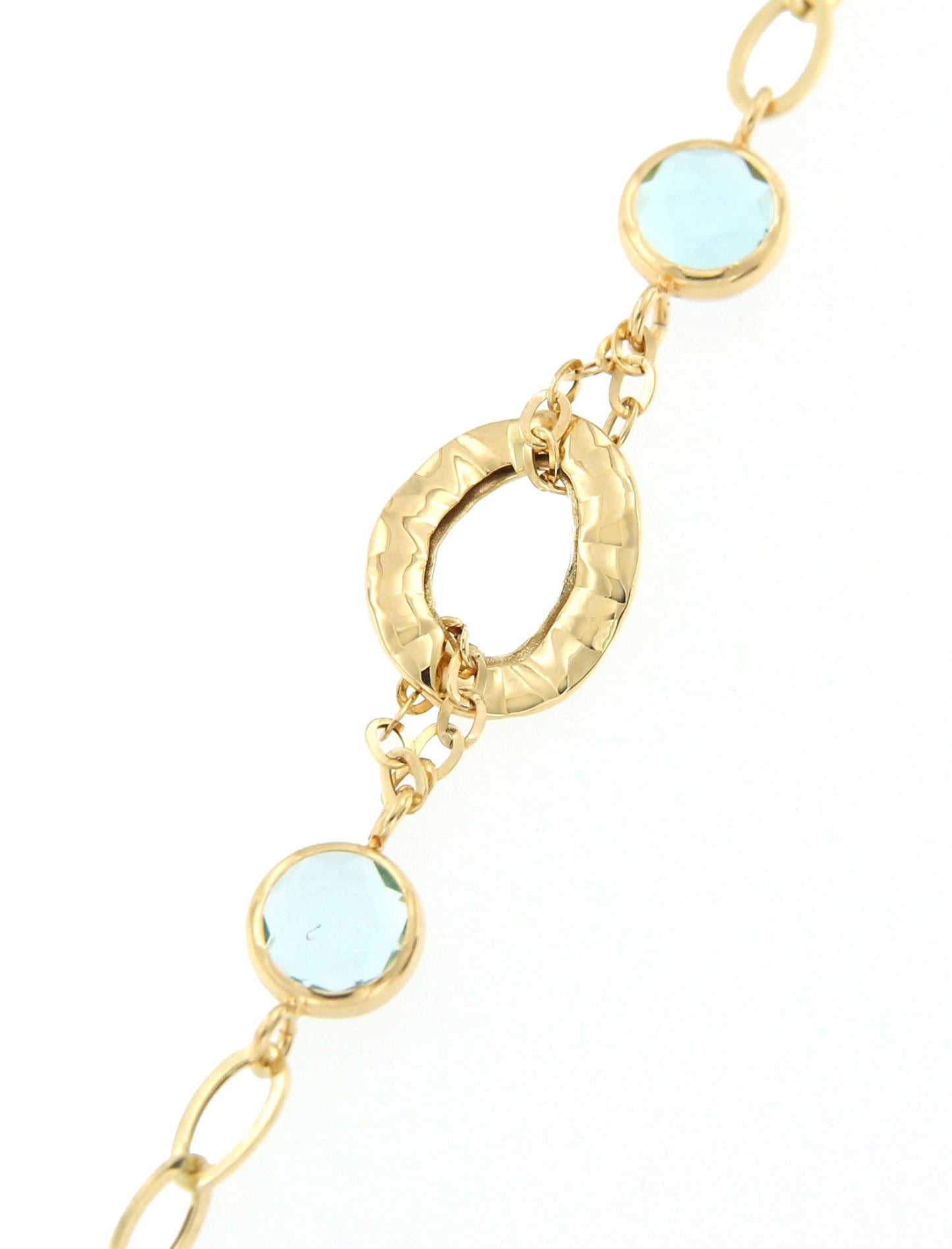 Pulsera METIN oro amarillo de 18 ktes con topacios azules