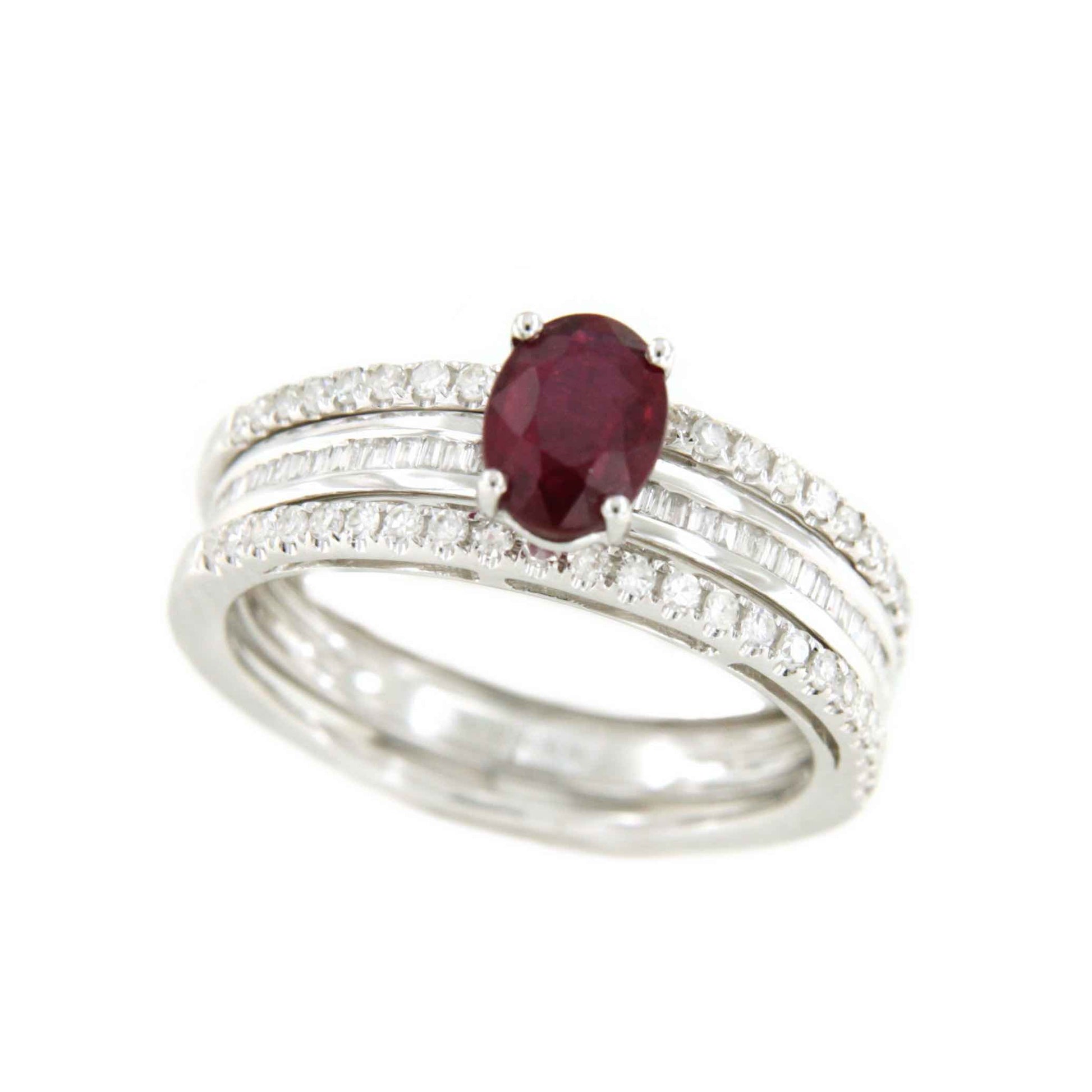 Anillo IRFAN en oro blanco con esmeralda, brillantes y baguettes