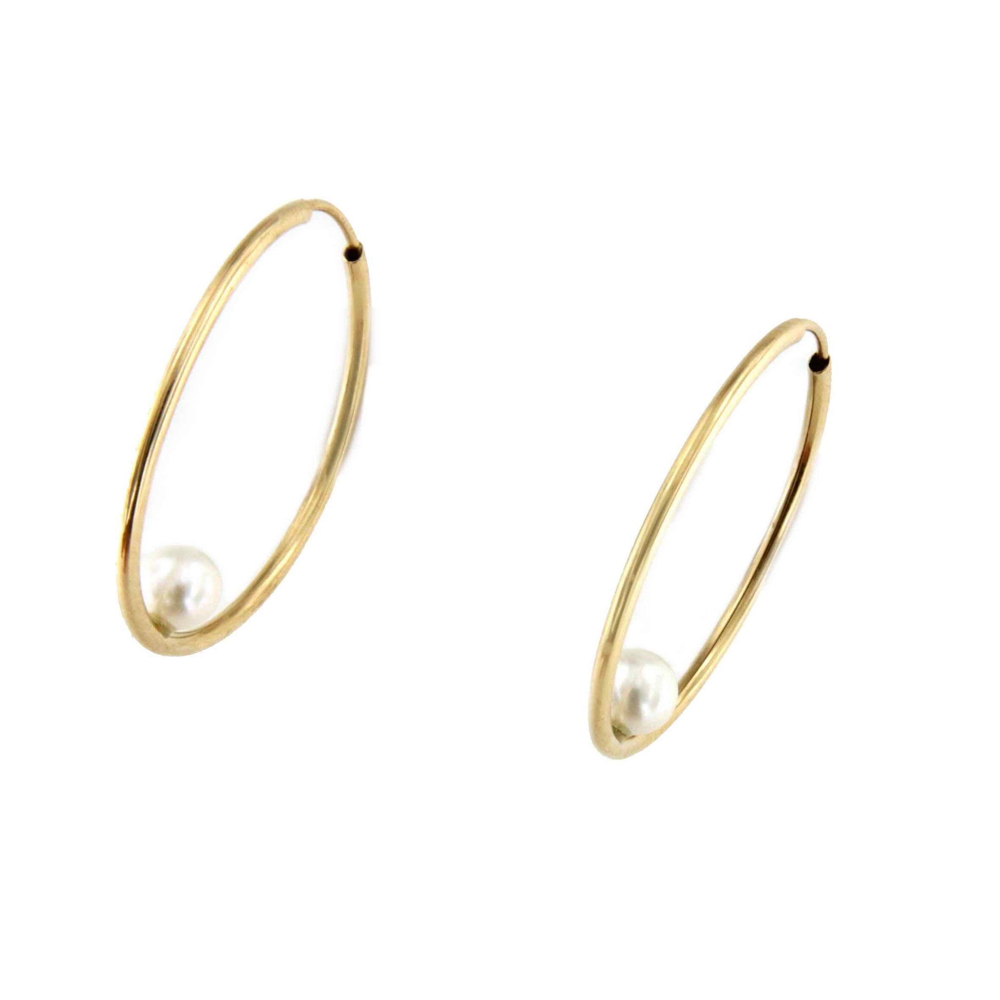 Argollas oro amarillo SOEL huecas en 18 kilates con perla