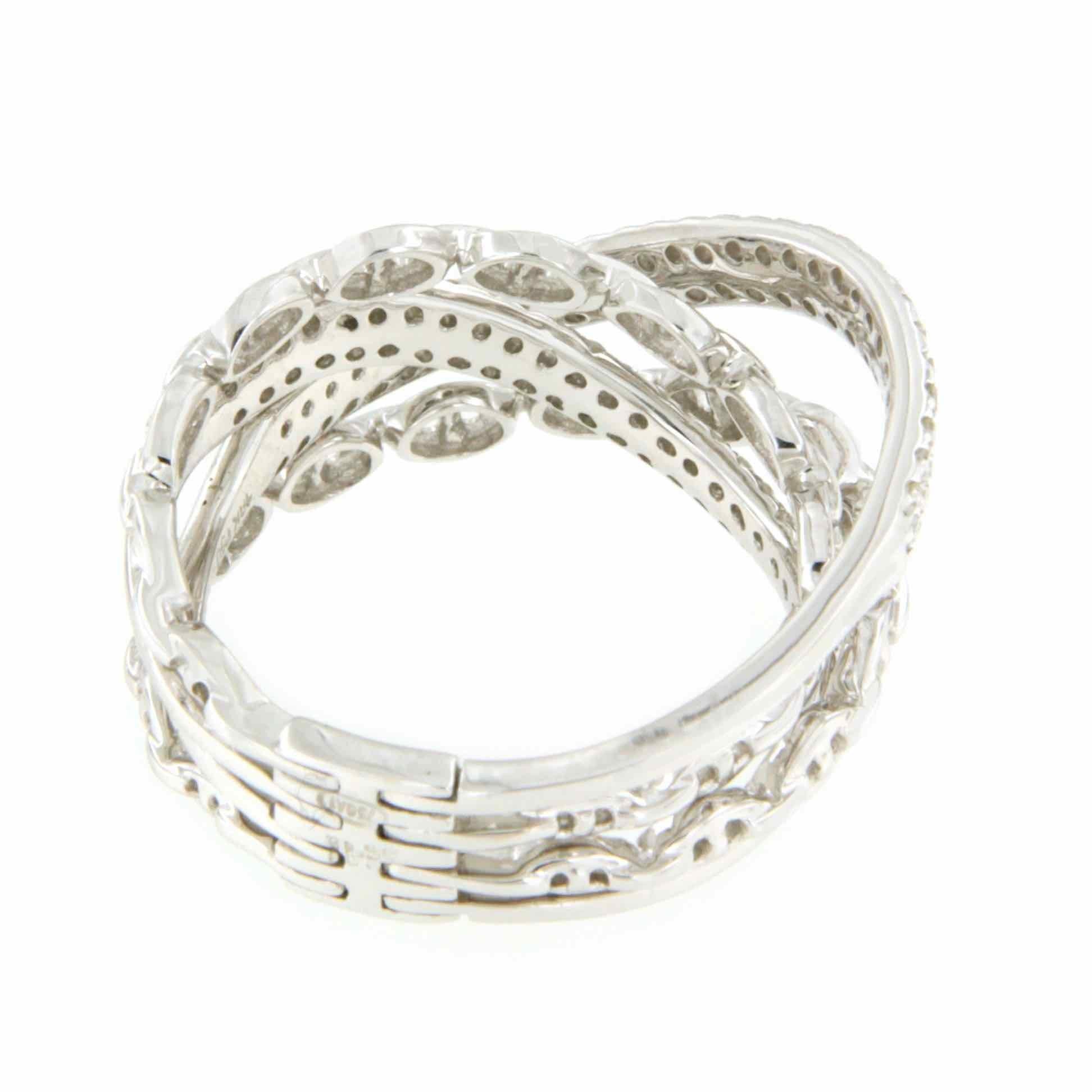 MODENA anillo de alianzas entrecruzadas con brillantes en oro - Roman Joyero