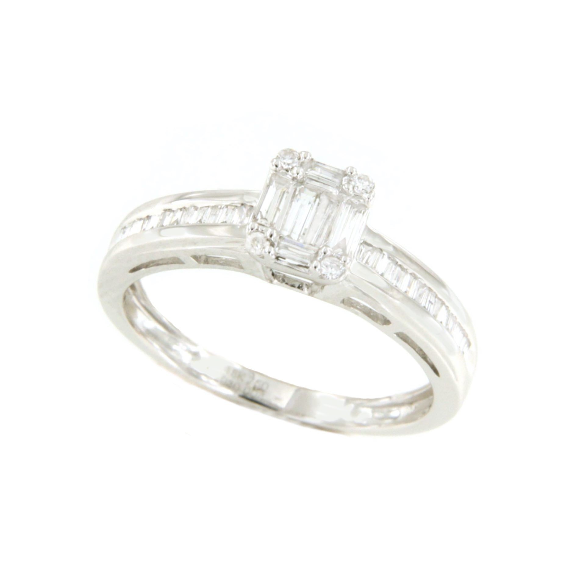 SWING anillo con centro baguettes y taipes en oro blanco 18K