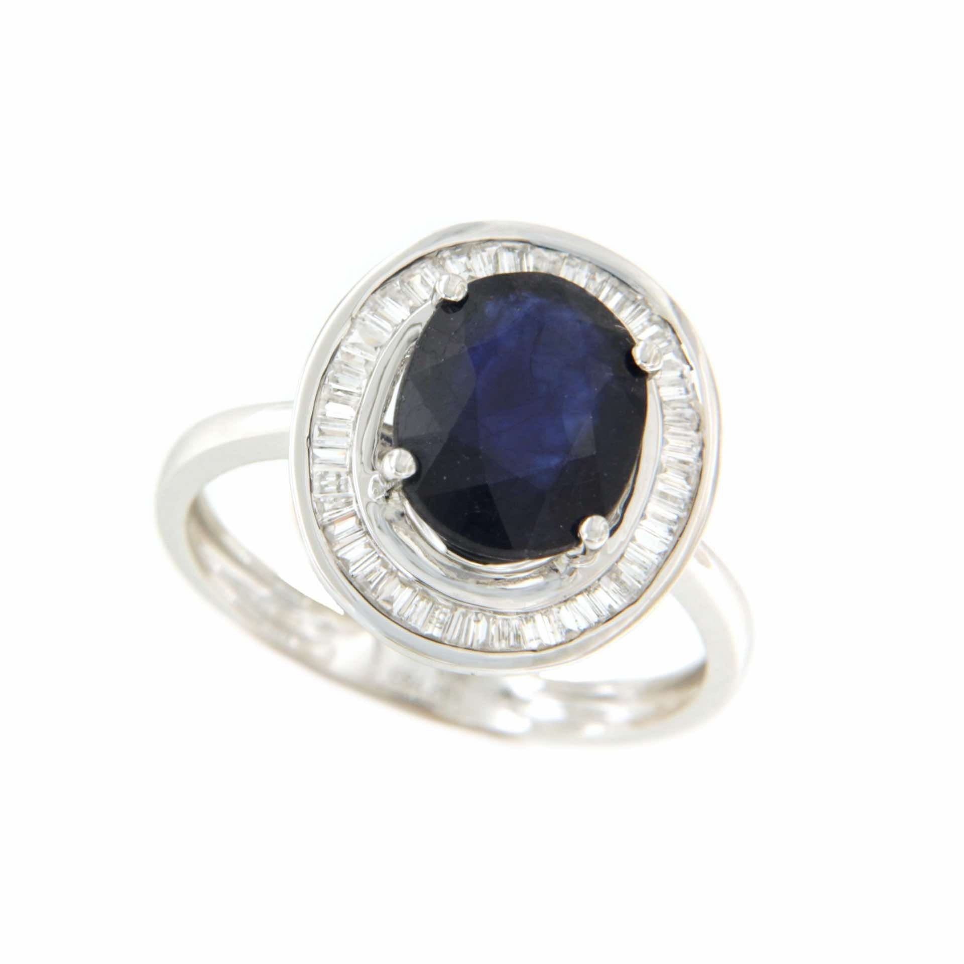 VALS anillo oro 18k de esmeralda rodeadas de taipes de brillantes