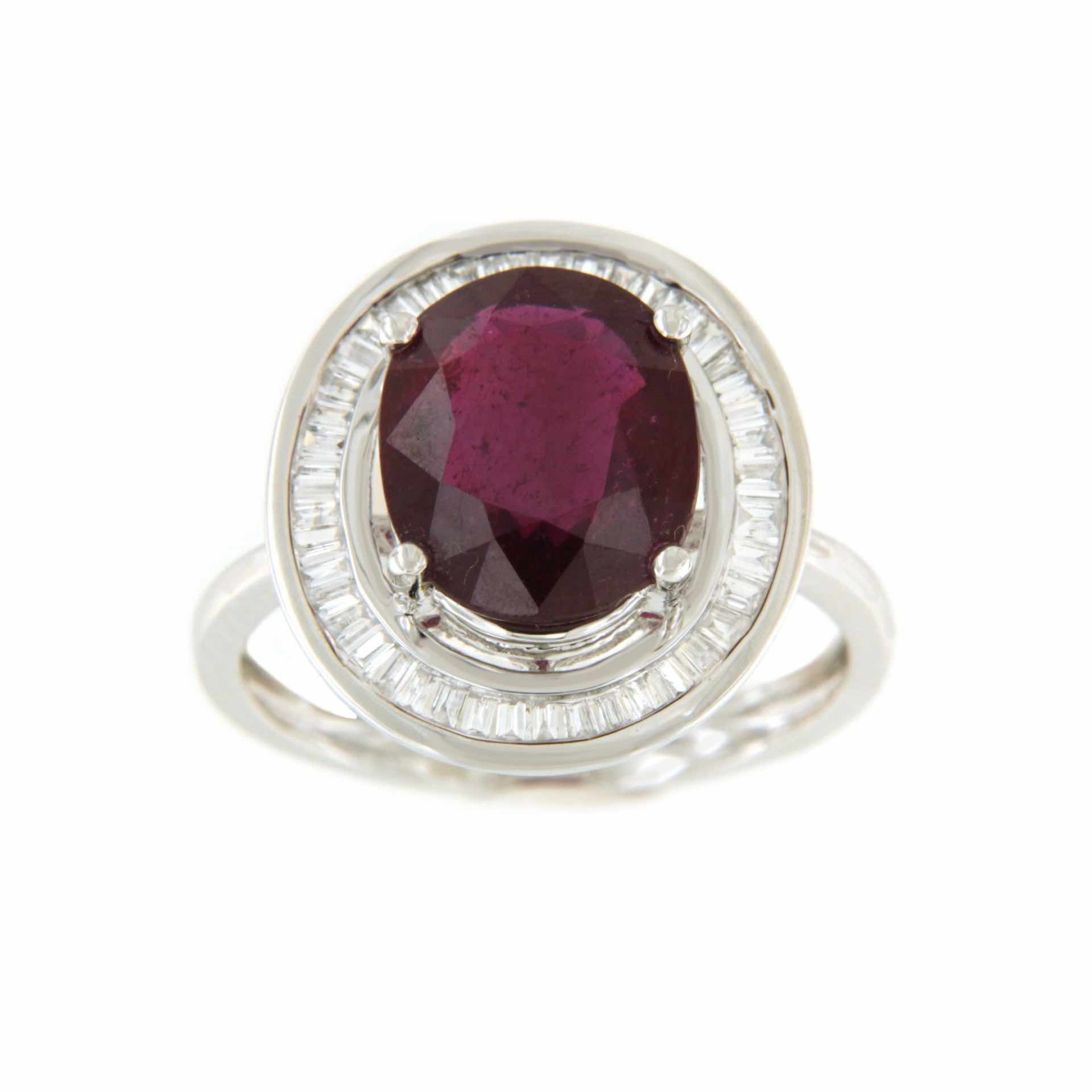 VALS anillo oro 18k de esmeralda rodeadas de taipes de brillantes