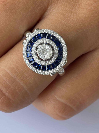 BROLY anillo forma redonda en oro blanco brillantes y zafiros - Roman Joyero