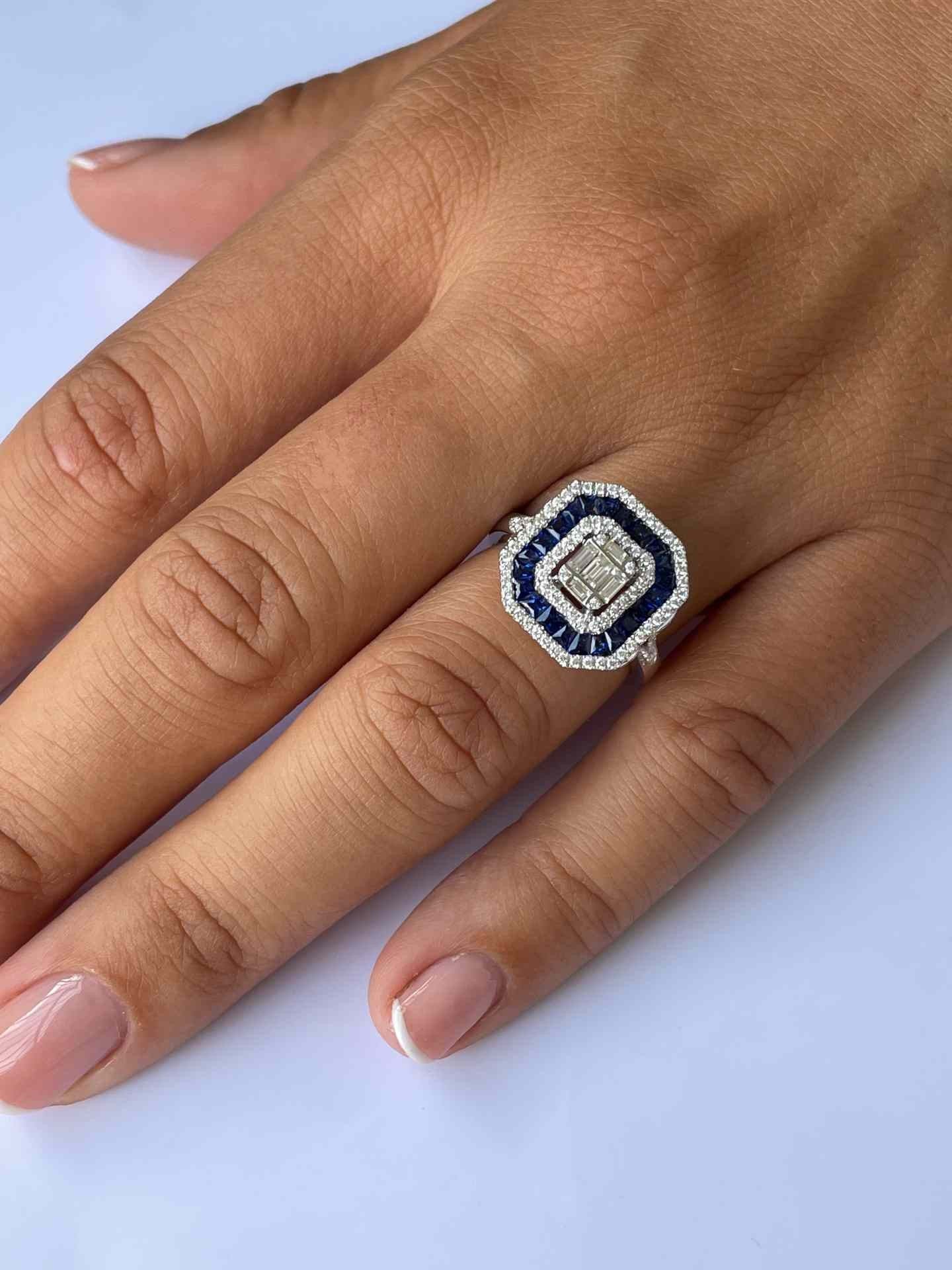 CYGNUS anillo rectangular oro blanco brillantes y zafiros