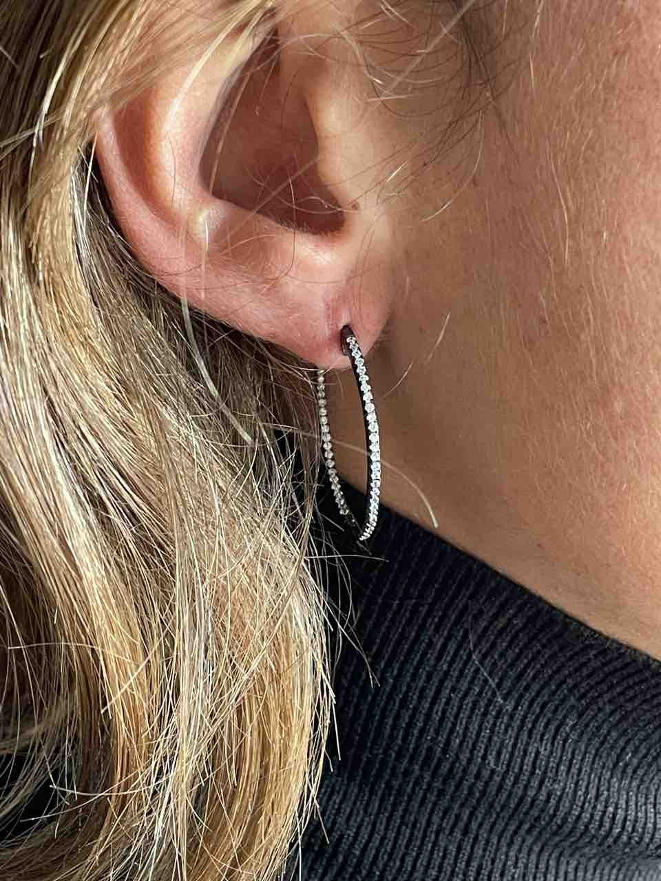 Argollas de plata con baño de oro o de rodio y circonitas