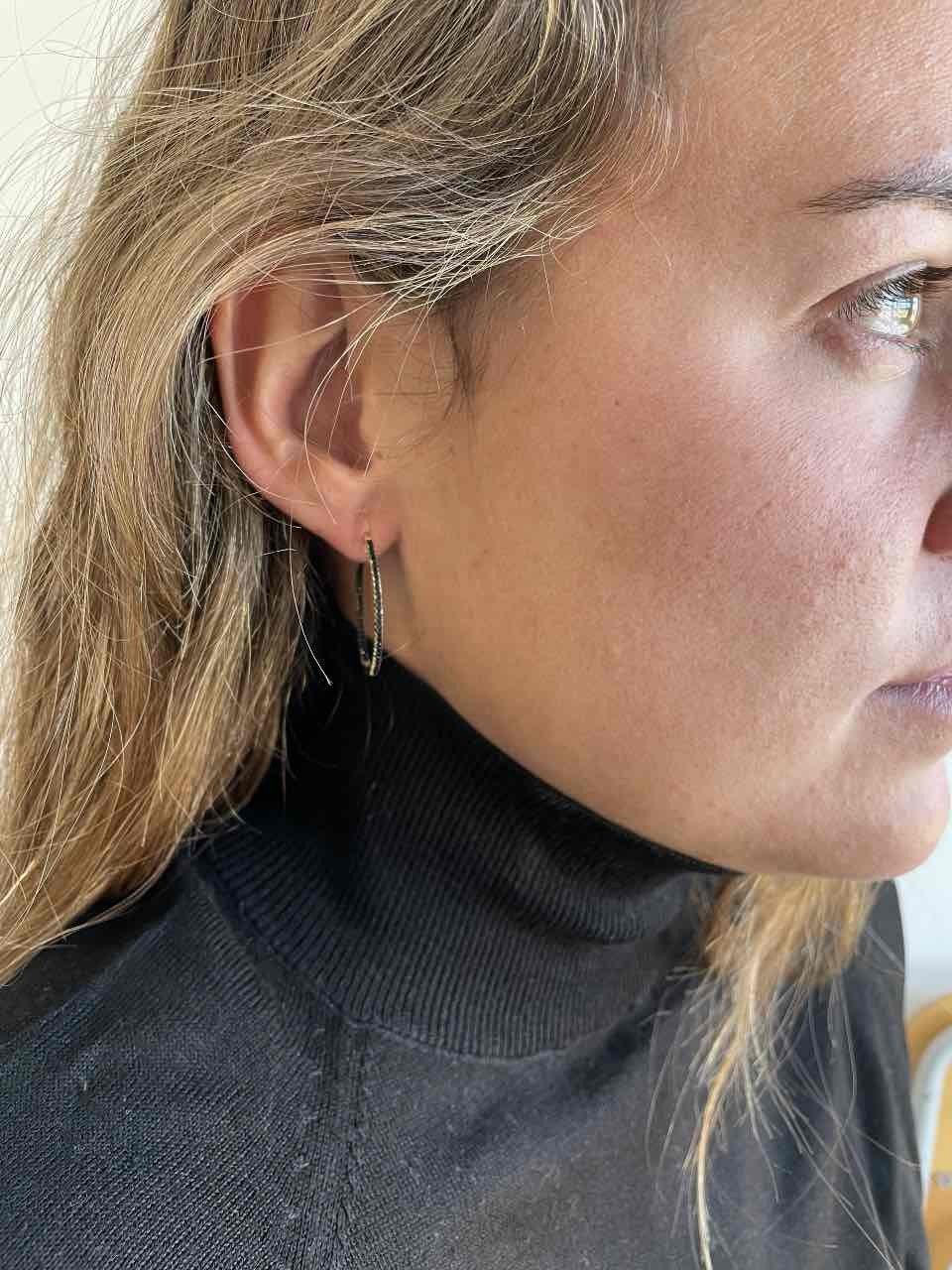 Argollas de plata con baño de oro o de rodio y circonitas