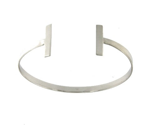 ALTAIRE, pulsera rígida plata con símbolo absoluto. - Roman Joyero