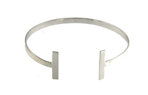 ALTAIRE, pulsera rígida plata con símbolo absoluto. - Roman Joyero