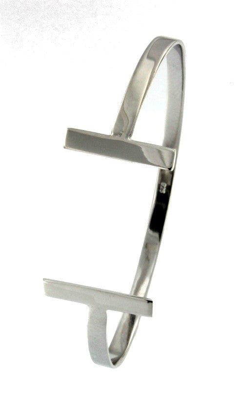 ALTAIRE, pulsera rígida plata con símbolo absoluto. - Roman Joyero