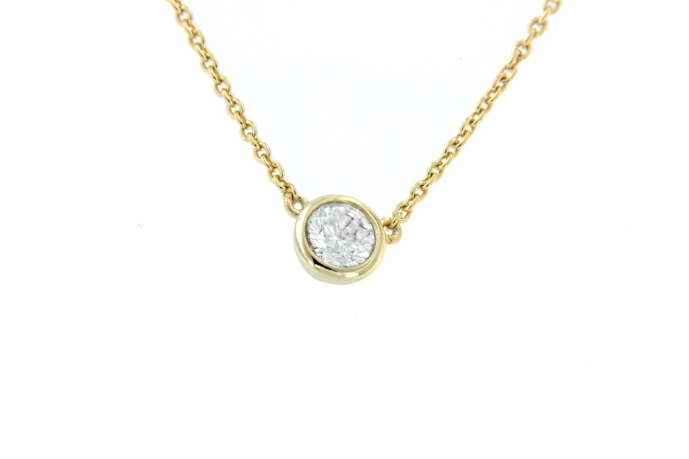 CAOS, collar de plata dorada con chatón y circonita. - Roman Joyero