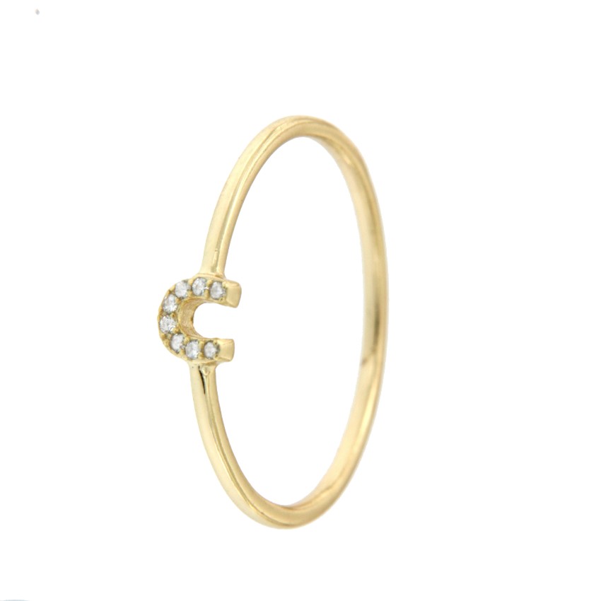 Anillo de plata con baño de oro y herradura engastada en circonita - Roman Joyero