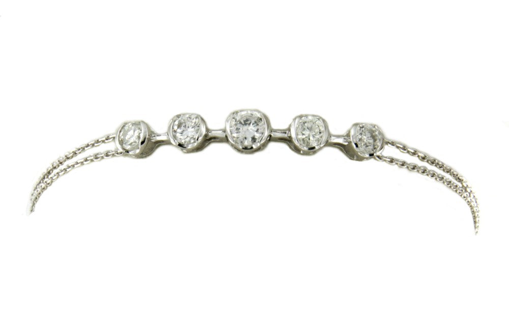 Pulsera de oro blanco 18 kts con diamantes en talla brillante - Roman Joyero