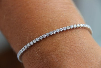 Pulsera riviere de oro blanco de 18 kilates con diamantes - Roman Joyero