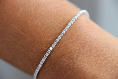 Pulsera riviere en oro blanco de 18 kilates con diamantes - Roman Joyero
