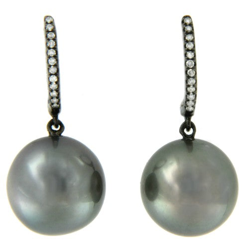 Argolla en oro de 18 kts, diamante y perla australiana negra