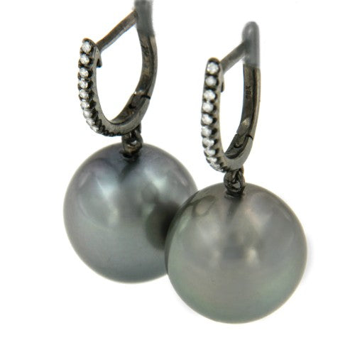 Argolla en oro de 18 kts, diamante y perla australiana negra