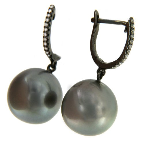 Argolla en oro de 18 kts, diamante y perla australiana negra