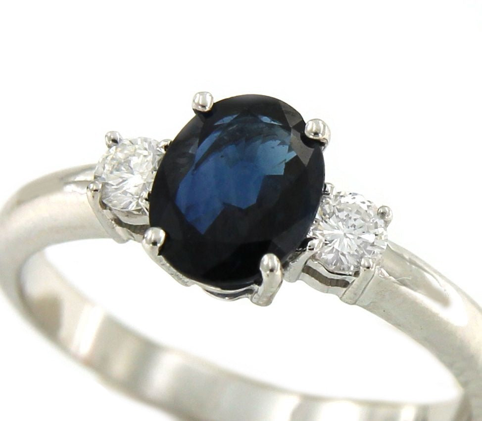 Alianza de oro blanco ALEV con zafiro y diamantes - Roman Joyero