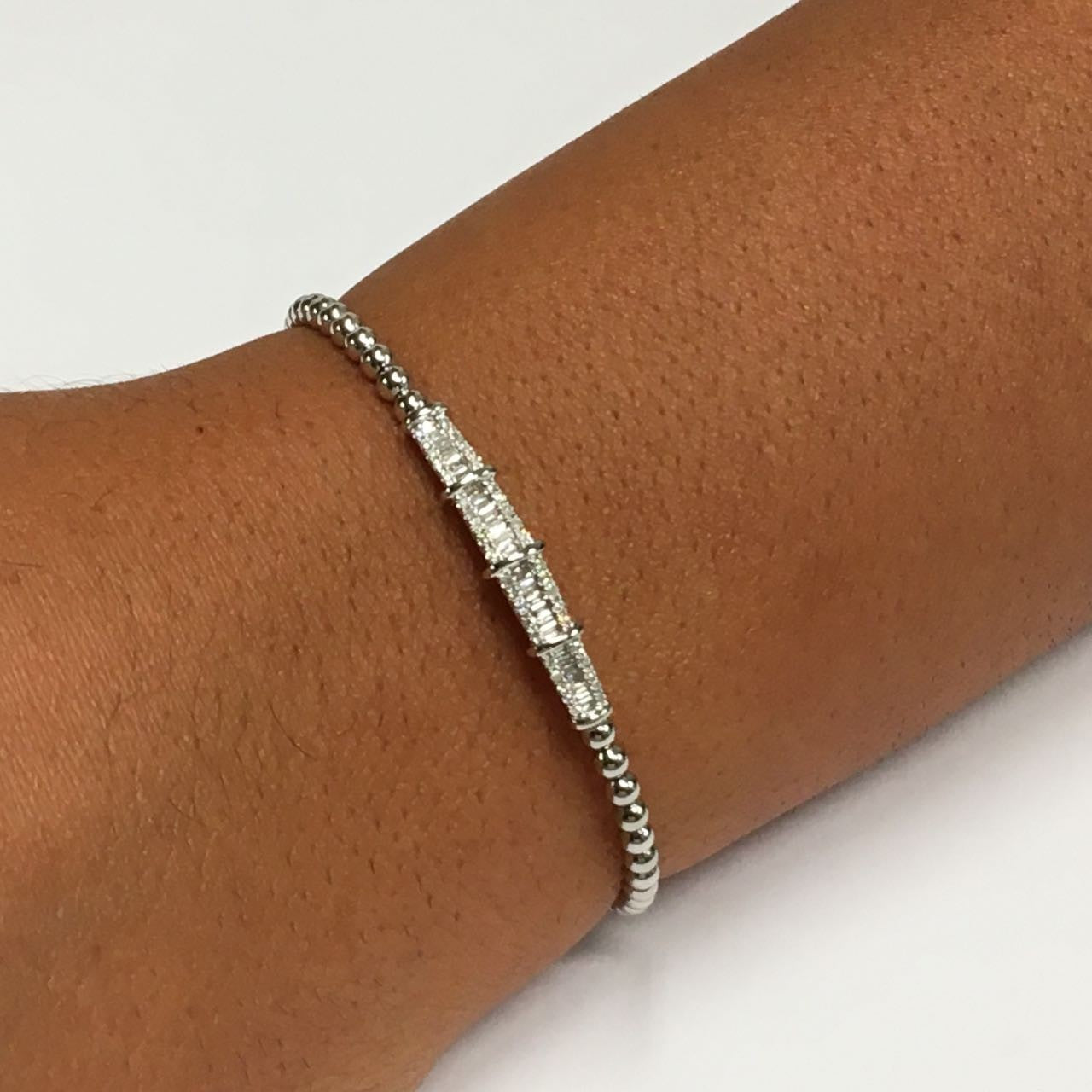 Pulsera rígida NADIYE en oro blanco con baguettes y brillantes - Roman Joyero