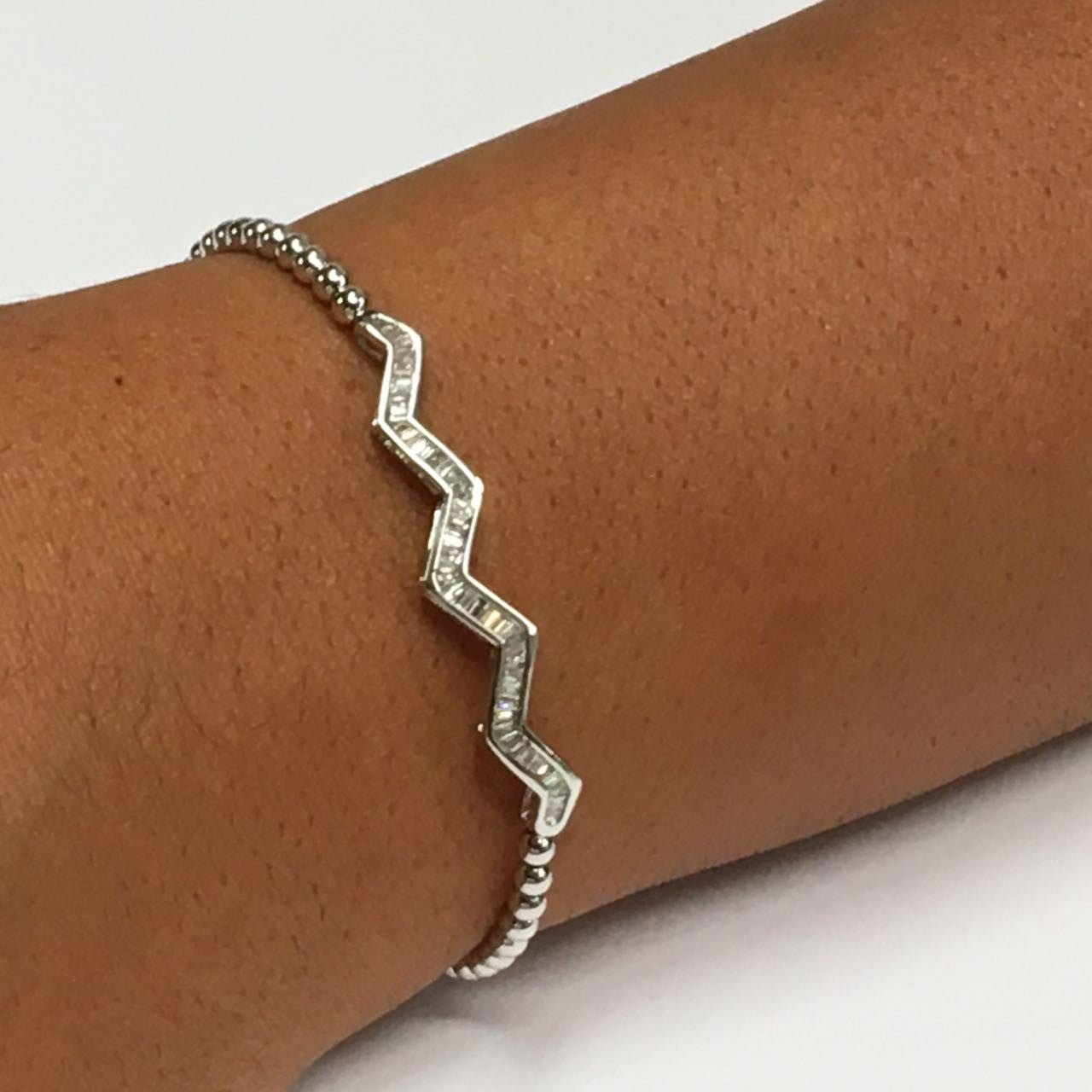 Pulsera rígida NAZLI en oro blanco con baguettes y bolitas de oro - Roman Joyero