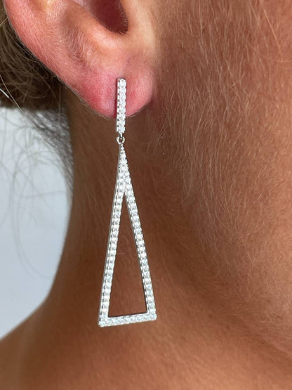 Pendientes IPANEMA largos en plata de primera ley con circonitas.