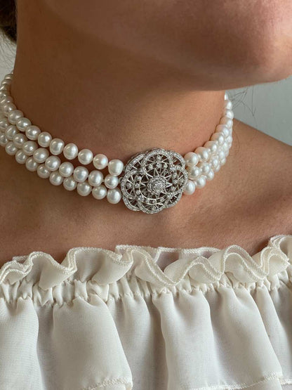 CLAUDIA choker made of Chinese pearls with a silver center and cubic zirconia