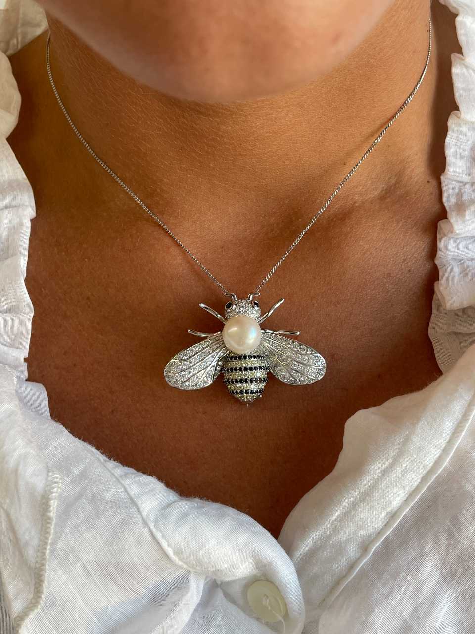 Broche MIEL plata de 925 ml con circonitas con perla cultivada de agua dulce