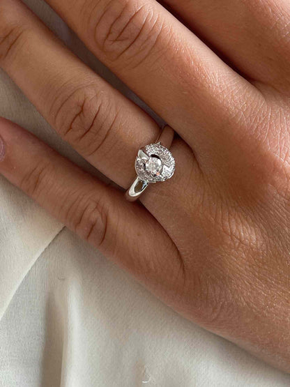 IMBE solitaire diamond ring with illusion view in 18k gold.