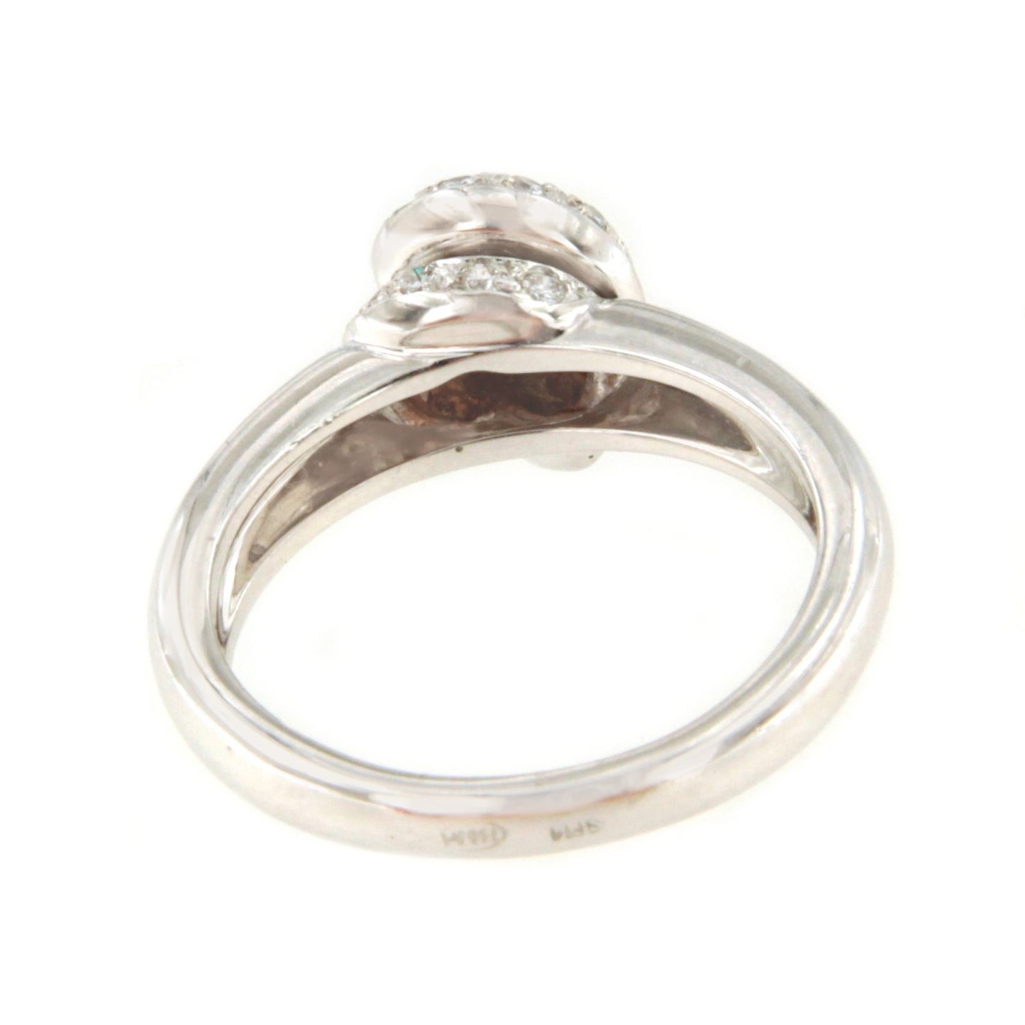 IMBE solitaire diamond ring with illusion view in 18k gold.