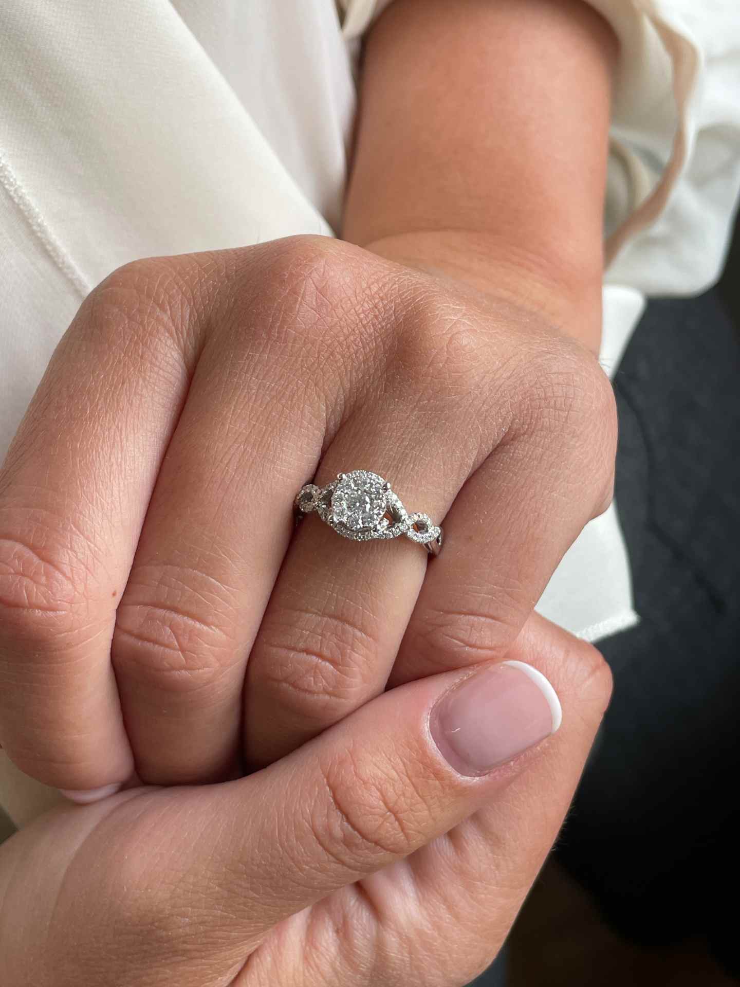 ACAI ring with rosette and halo and diamonds in 18-karat white gold