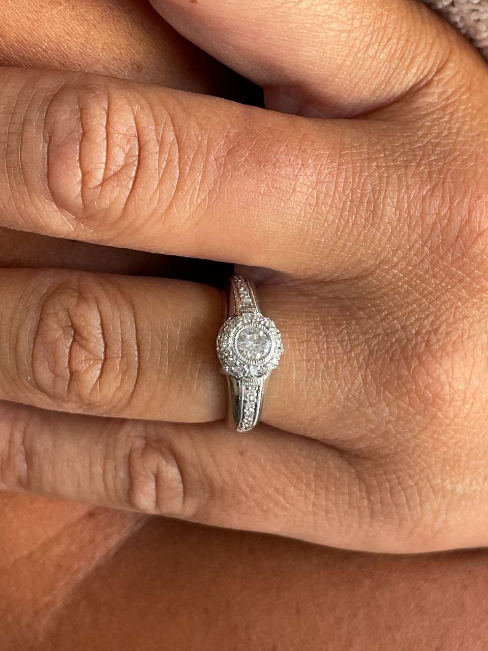 SENS solitaire ring with diamonds in 18-karat white gold