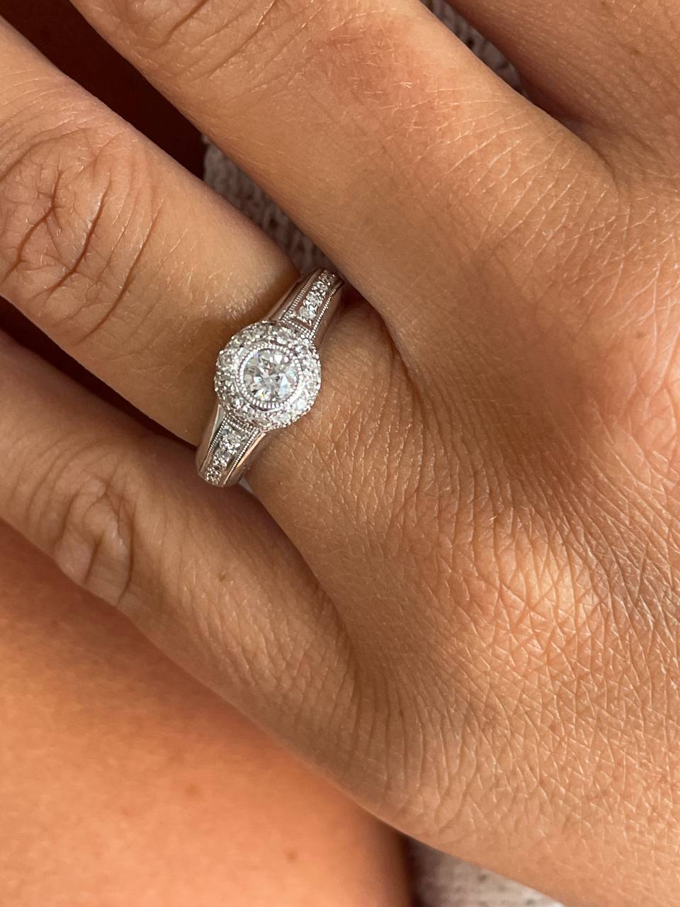 SENS solitaire ring with diamonds in 18-karat white gold