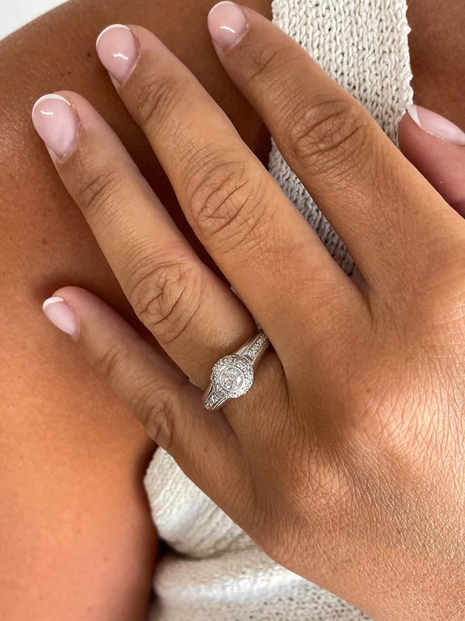 SENS solitaire ring with diamonds in 18-karat white gold