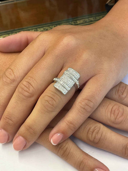 Anillo VALDEPRADO en oro blanco 18 ktes con princesas y baguettes