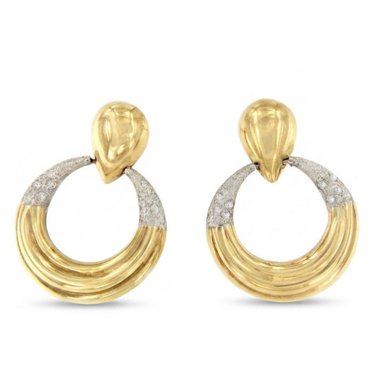 PEUMO short earrings in 18-karat yellow gold and diamonds.