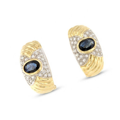 PEUMO short earrings in 18-karat yellow gold and diamonds.