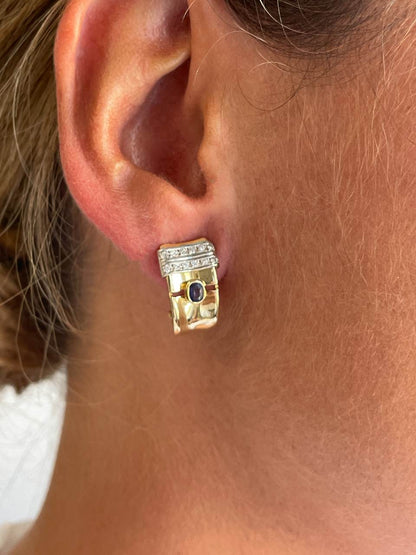 PEUMO short earrings in 18-karat yellow gold and diamonds.