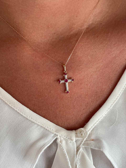 CLARIVA cross in 14k gold with diamonds and sapphire/emerald