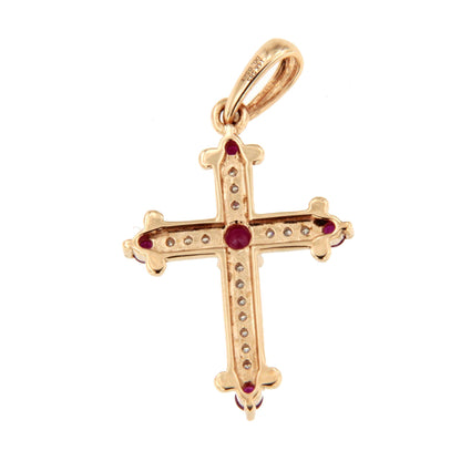 CLARIVA cross in 14k gold with diamonds and sapphire/emerald